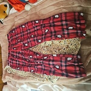 Red and Black Pajama pants with penguins on them